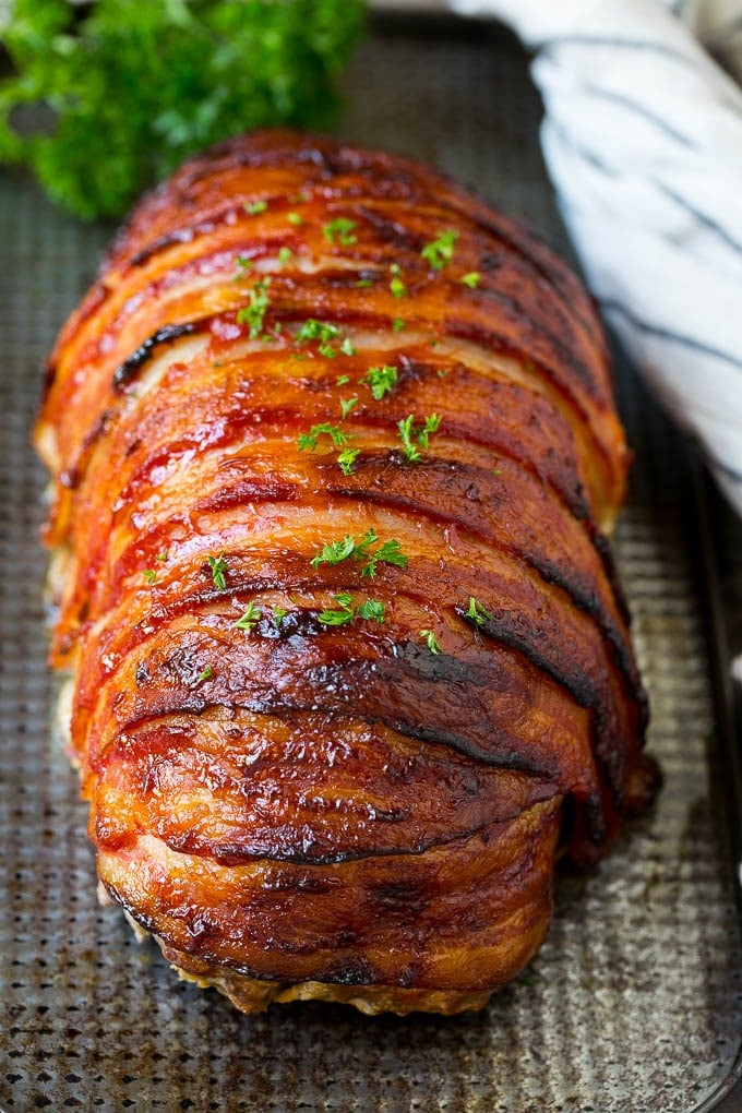 Bacon Wrapped Meatloaf Recipe | Beef Meatloaf #meatloaf #beef #groundbeef #bacon #dinner #bajap Meatloaf wrapped in slices of bacon and baked, then topped with parsley.