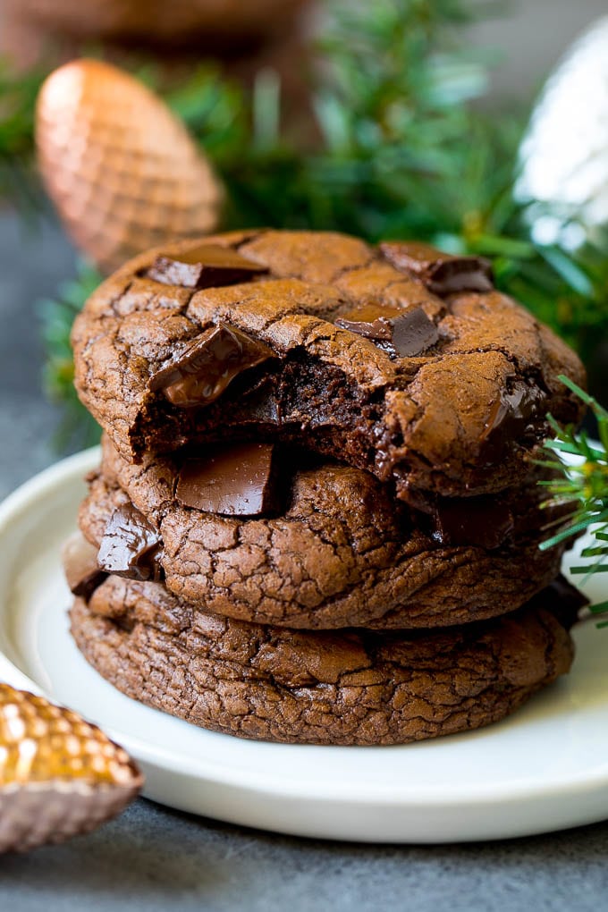 Brownie Cookies Recipe | Chocolate Cookies #cookies #brownies #chocolate #dessert #baking #bajap A stack of brownie cookies with a bite taken out of one.