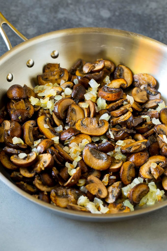 Chicken Stroganoff Recipe | Chicken and Mushrooms #chicken #mushrooms #stroganoff #dinner #bajap Sauteed mushrooms and onions in a skillet.