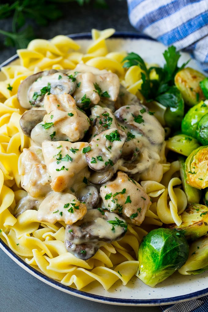 Chicken Stroganoff Recipe | Chicken and Mushrooms #chicken #mushrooms #stroganoff #dinner #bajap Chicken stroganoff over egg noodles with brussels sprouts on the side.