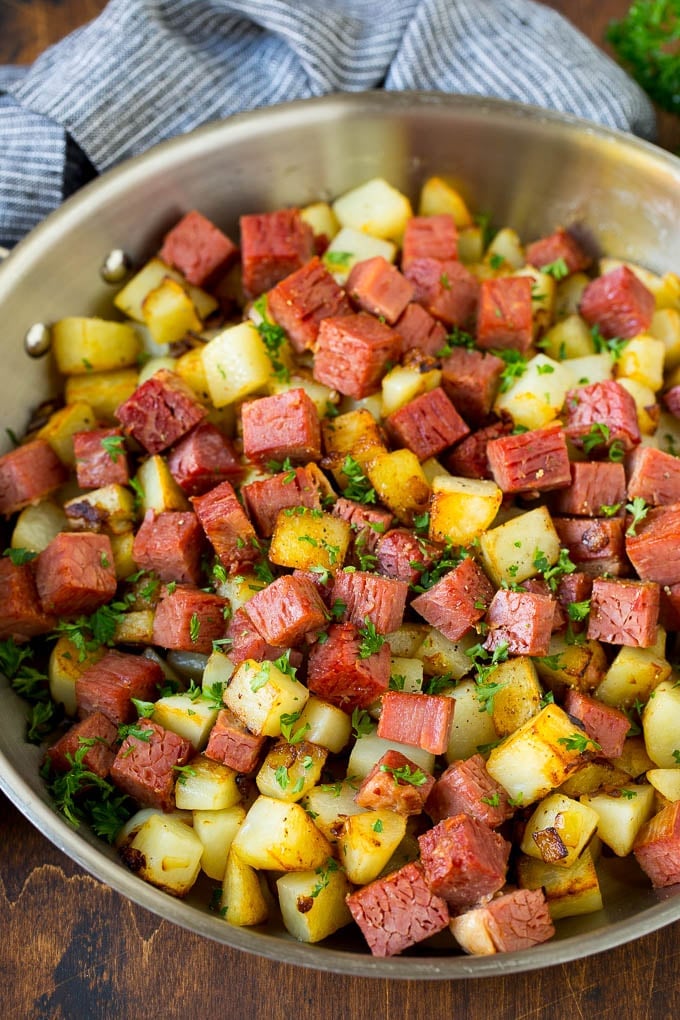 Corned Beef Hash Recipe #hash #cornedbeef #stpatricksday #breakfast #brunch #potatoes #bajap Corned beef hash with potatoes, onions and fresh herbs.