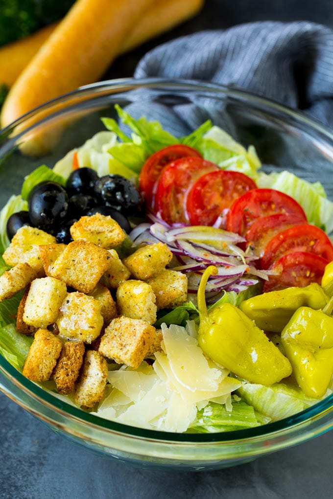 Olive Garden Salad Recipe | Italian Salad #salad #lettuce #olives #sidedish #dinner #bajap Olive Garden salad with tomatoes, croutons, cheese and olives.