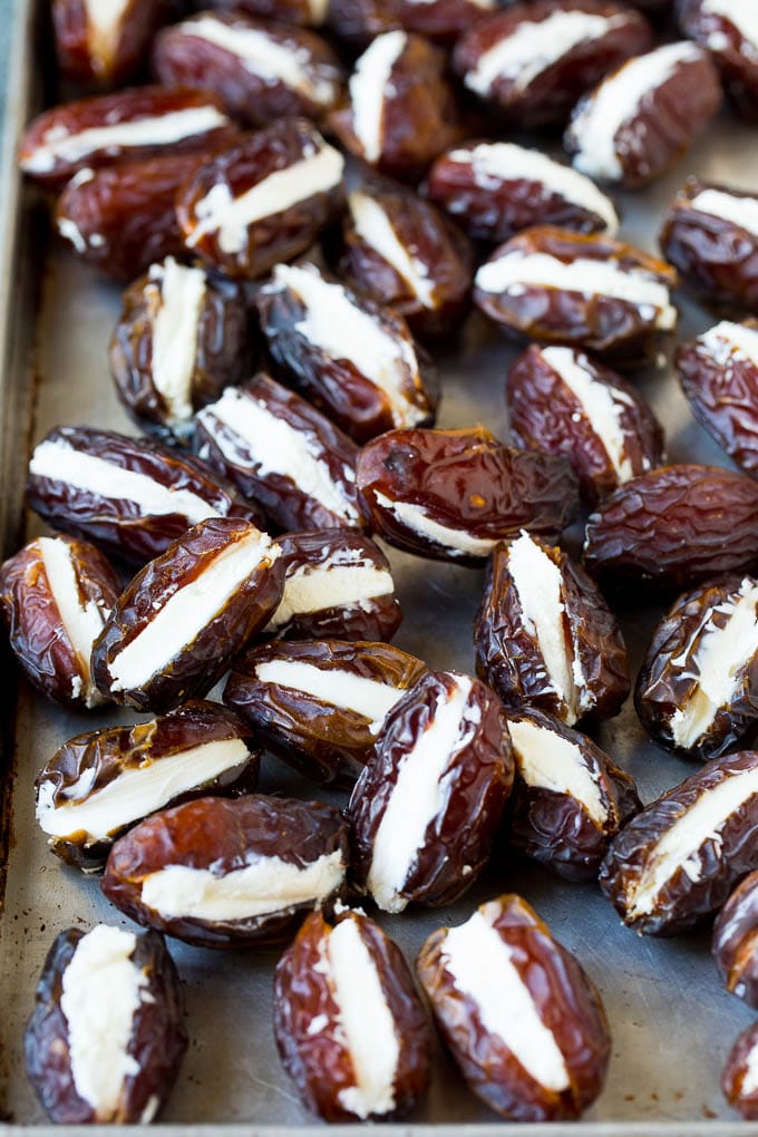Bacon Wrapped Dates #appetizer #bacon #dates #cheese #bajap Dates cut in half and filled with goat cheese.