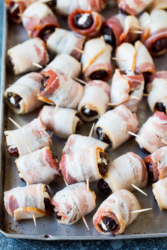Bacon Wrapped Dates #appetizer #bacon #dates #cheese #bajap Dates wrapped in bacon and secured with toothpicks.