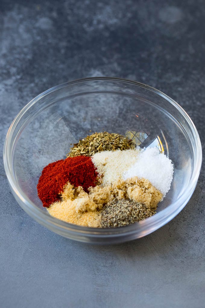 Baked Chicken Breast Recipe #chicken #dinner #bajap Herbs and seasonings in a mixing bowl.
