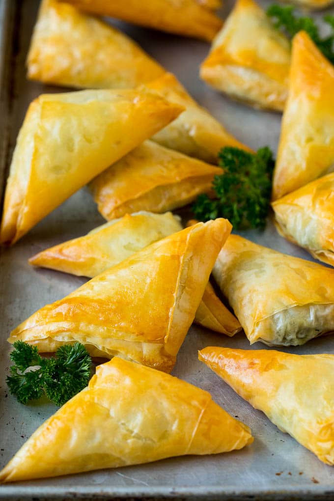 Spanakopita Recipe #appetizer #snack #spinach #cheese #bajap Baked spanakopita filled with spinach and cheese.