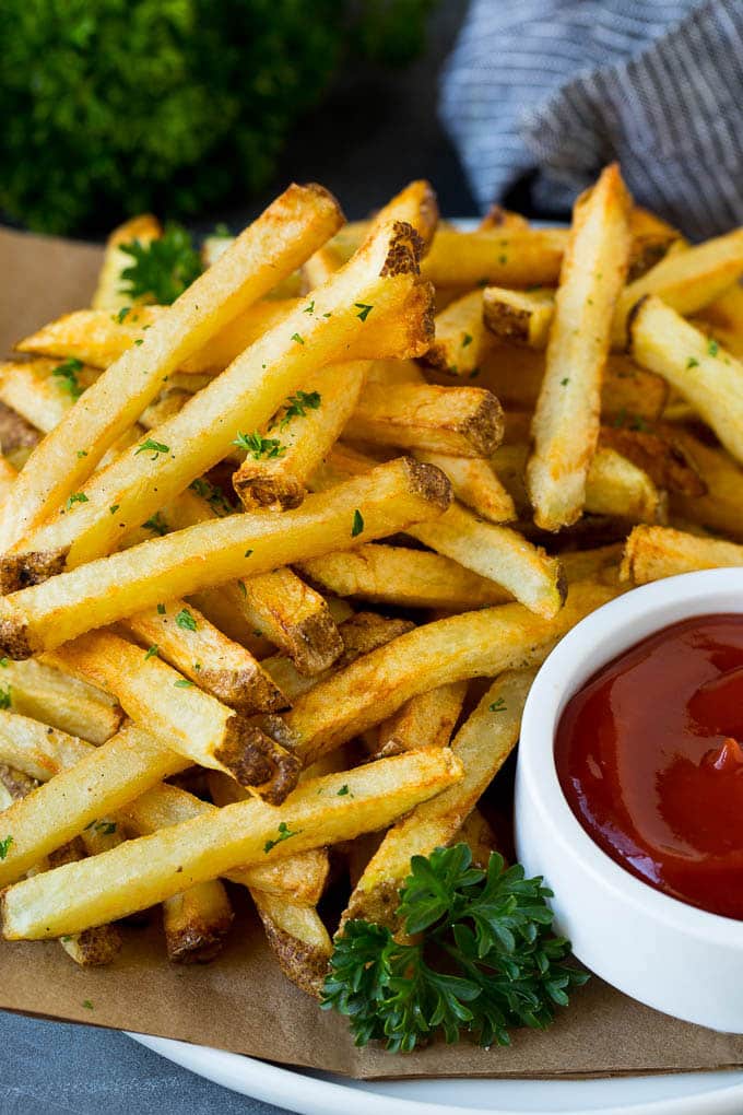 Homemade French Fries Recipe #potatoes #fries #dinner #bajap A plate of homemade french fries served with a bowl of ketchup.