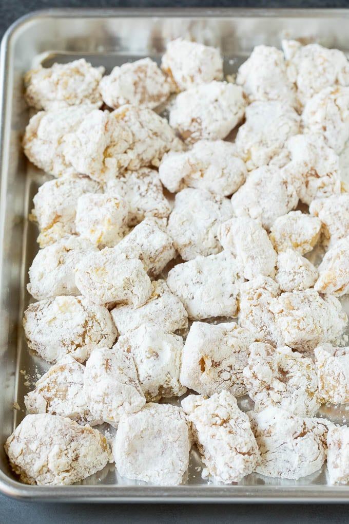 This honey chicken is crispy pieces of chicken breast that are fried to golden brown perfection, then tossed in a sweet and savory honey sauce. Chicken pieces coated in corn starch and flour.