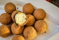 Decadent Boozy Eggnog Truffles with a Cocoa Dusting