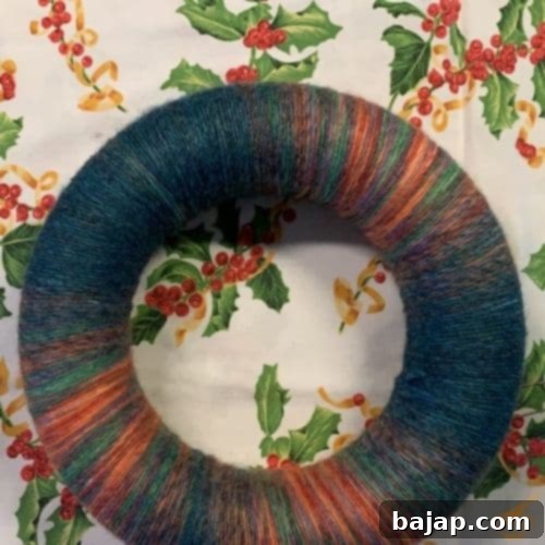 Completed woolen wreath base ready for candles and decorations