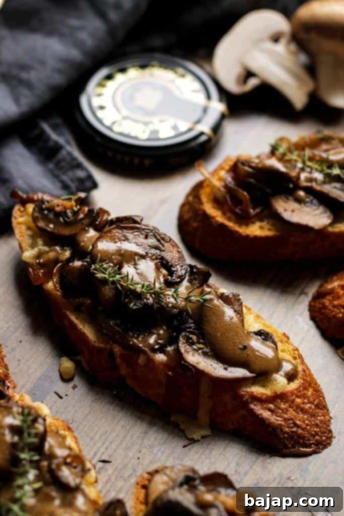These festive vegan mushroom crostini recipe is an easy and impressive appetizer perfect for holidays. Crunchy baguette with grilled vegan mozzarella topped with sweet caramelized onions and mushrooms with a hint of balsamic and Dijon mustard will surely be a show stopper.