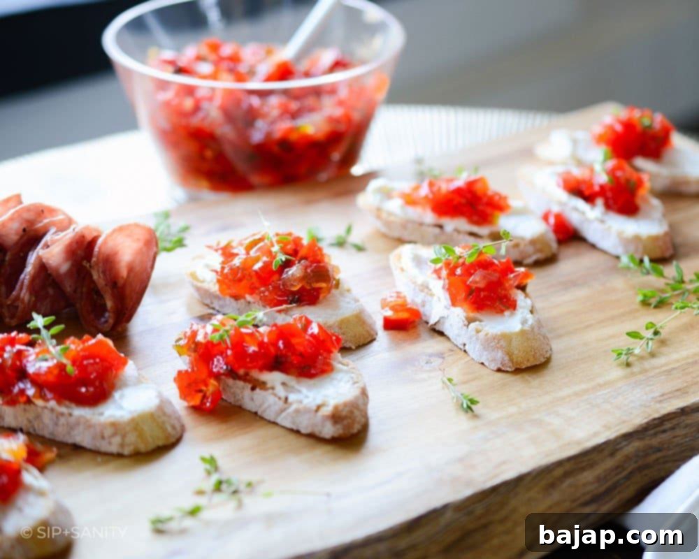 Serve Red Pepper Jam Goat Cheese Crostini at your next gathering and watch your guests keep going back for more. There is nothing better than tangy, pungent goat cheese contrasted with this sticky, sweet, and a tad spicy, jam.