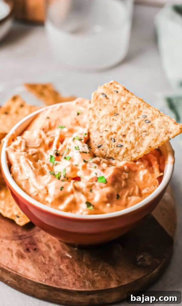 This Instant Pot Buffalo Chicken dip is affordable and easy to make. This spicy, creamy dip is loaded with chicken and cooks up in just minutes in your pressure cooker.