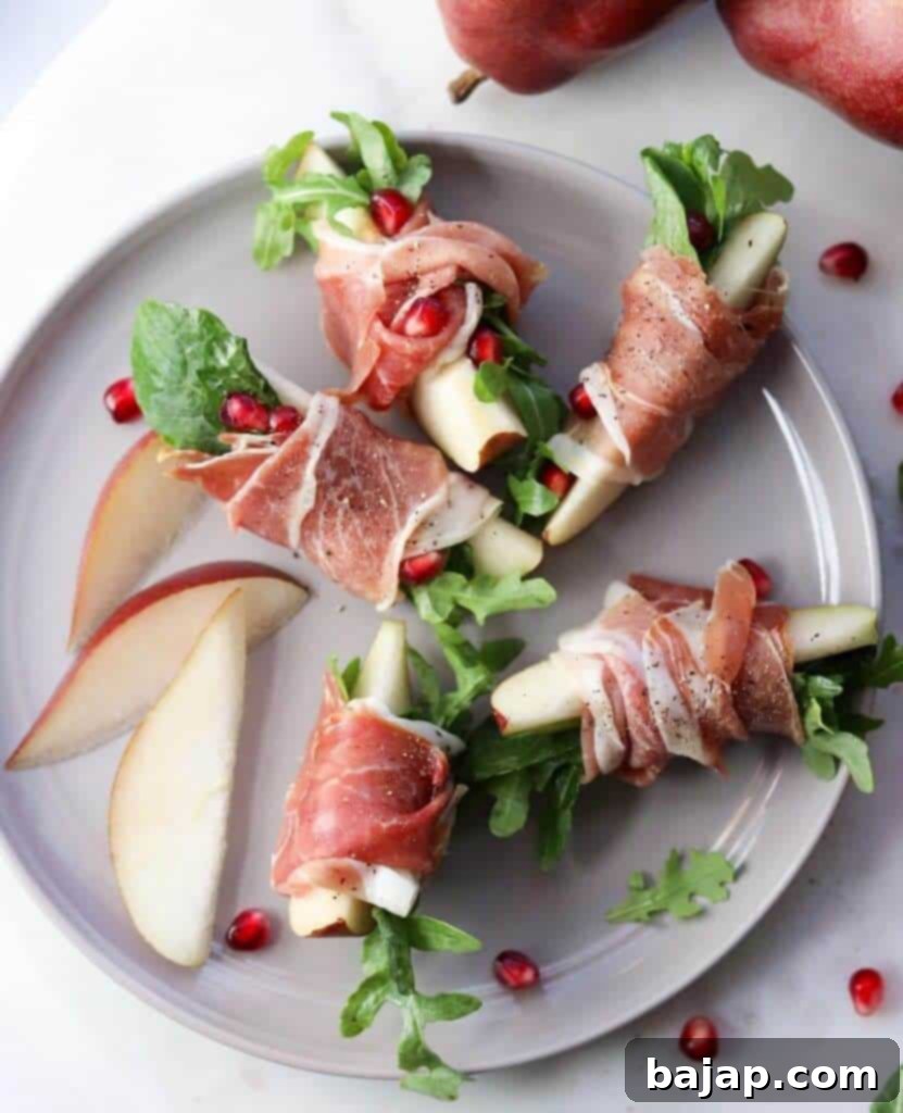 This is the perfect no-cook appetizer for your next holiday party or get-together! Prosciutto Pears with Arugula Salad are deliciously sweet AND savory - plus they're Whole30, Paleo & Gluten Free!