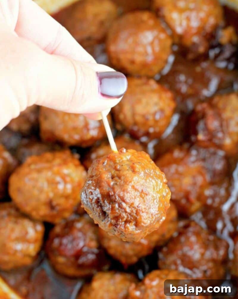 With 4 simple sauce ingredients plus frozen meatballs, these sweet and sour crockpot meatballs in cranberry bbq sauce take just minutes to assemble for your easiest appetizer nibble ever. This is an updated take of the old grape jelly and chili sauce slow cooker meatballs recipe.