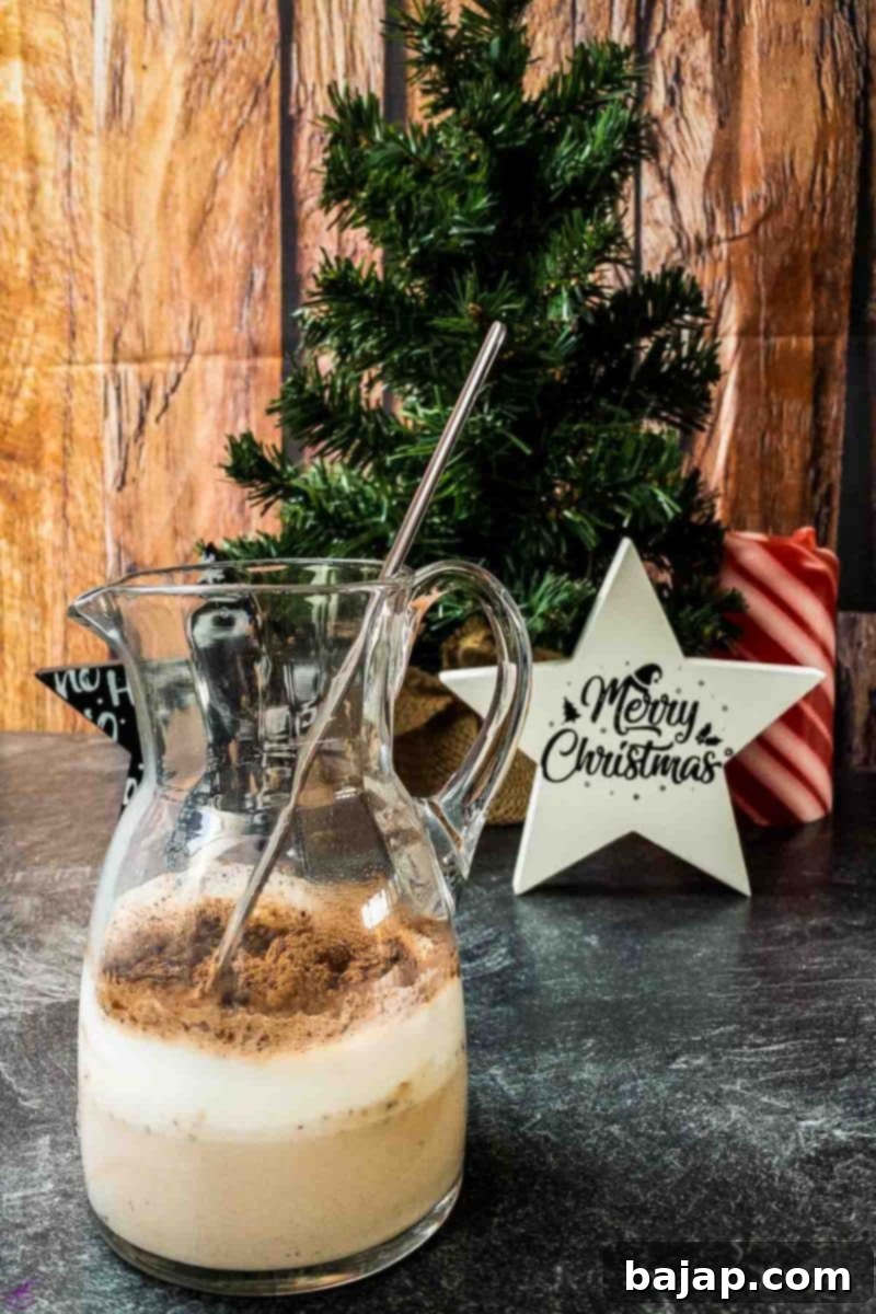 combine warm milk with raw cocoa powder