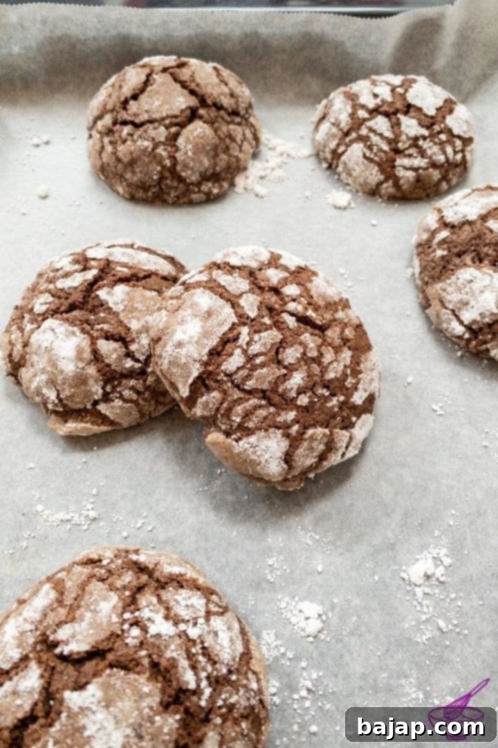 Finished Chocolate Espresso Crinkle Cookies on a cooling rack