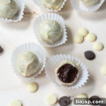 Homemade dark chocolate truffles with white chocolate coating