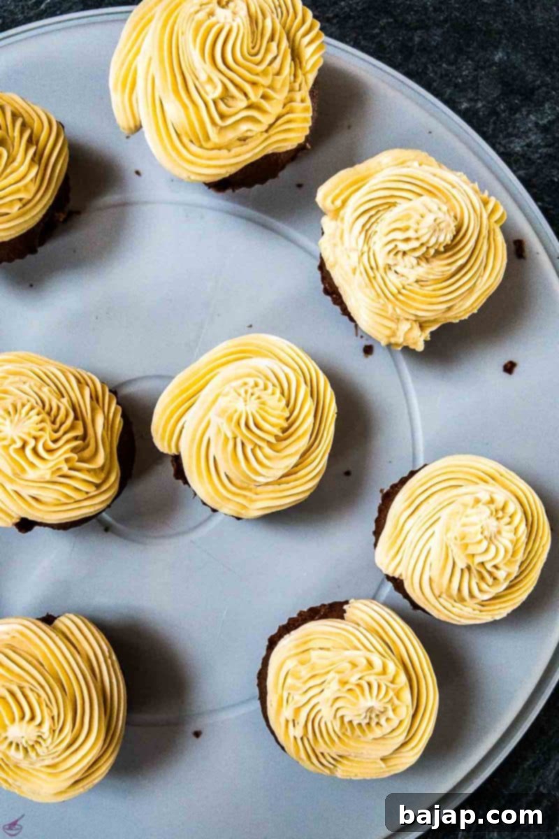 Piped with Bailey's buttercream on top.