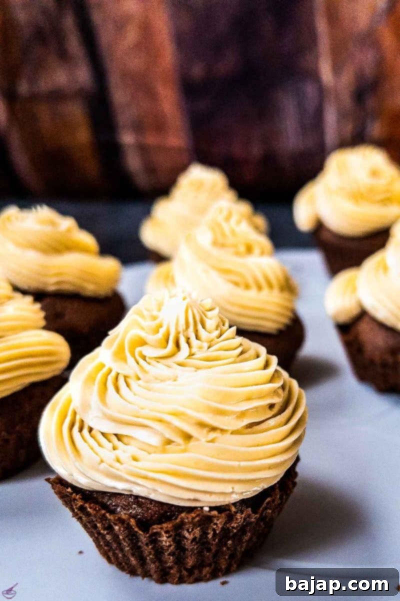 Boozy Baileys Salted Caramel Cupcakes with a delicious chocolate Sponge!