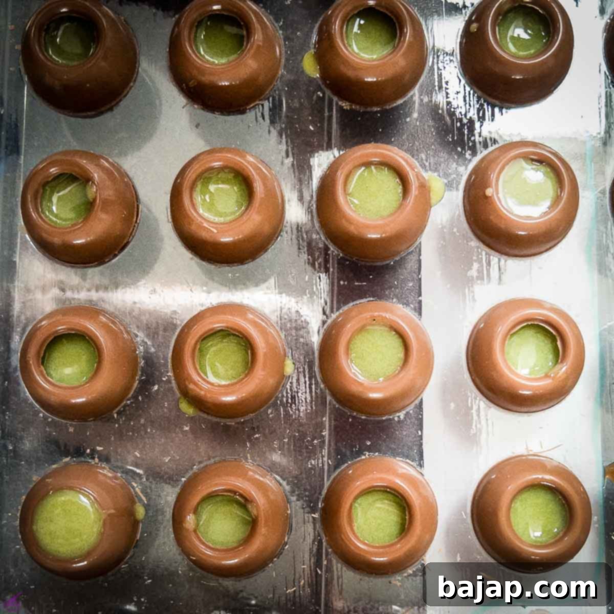 St Patricks Day Emerald Matcha Truffle Delight 6 Carefully fill the hollow spheres with the Matcha white chocolate ganache.