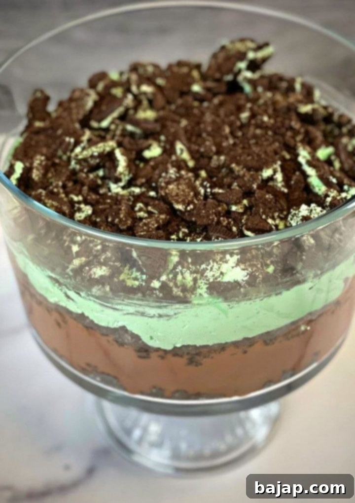 St. Patrick's Day Mint Oreo Pudding Cake in a trifle bowl, ready to serve