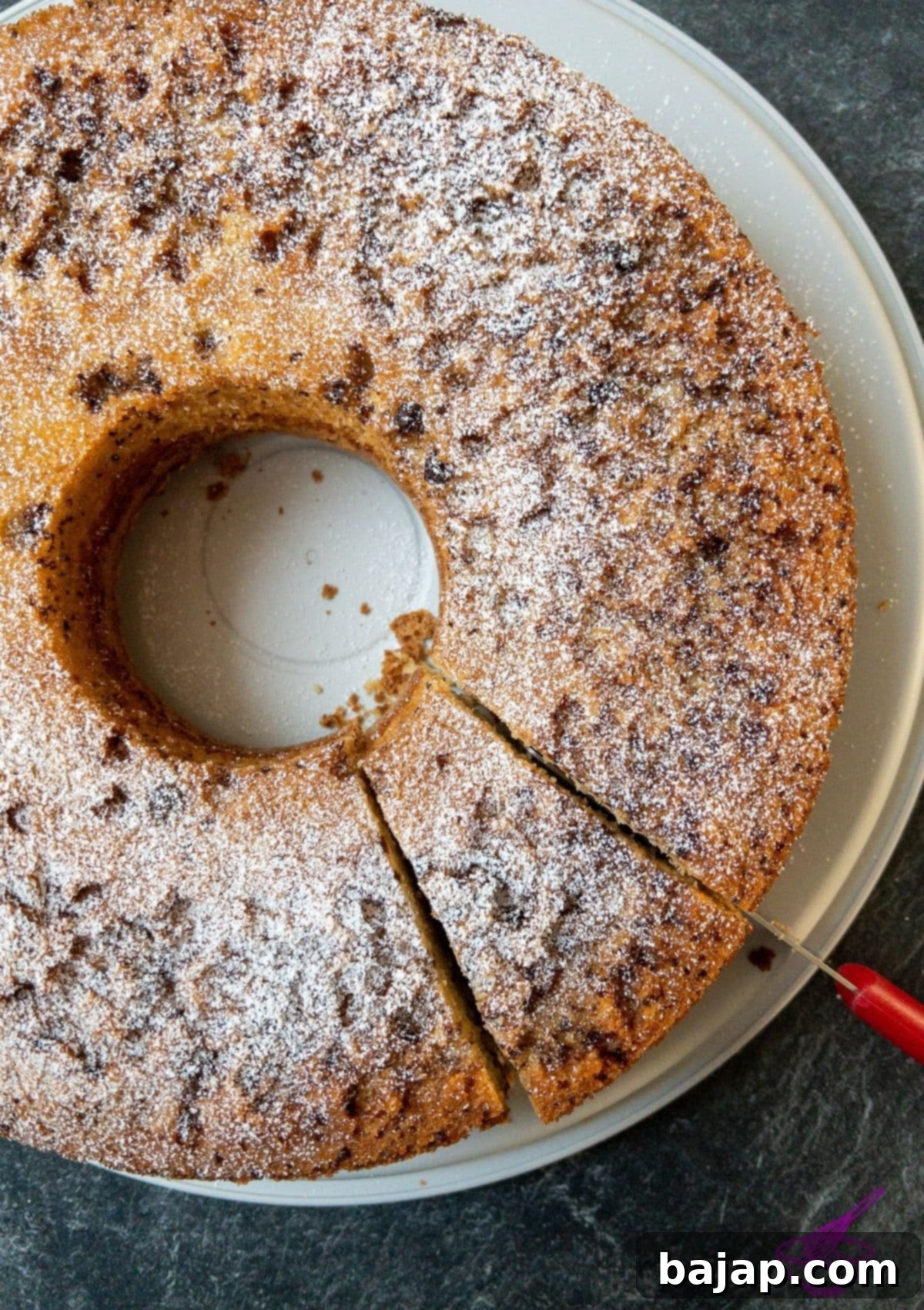A scrumptious fluffy slice of the best potato flour eggnog cake!