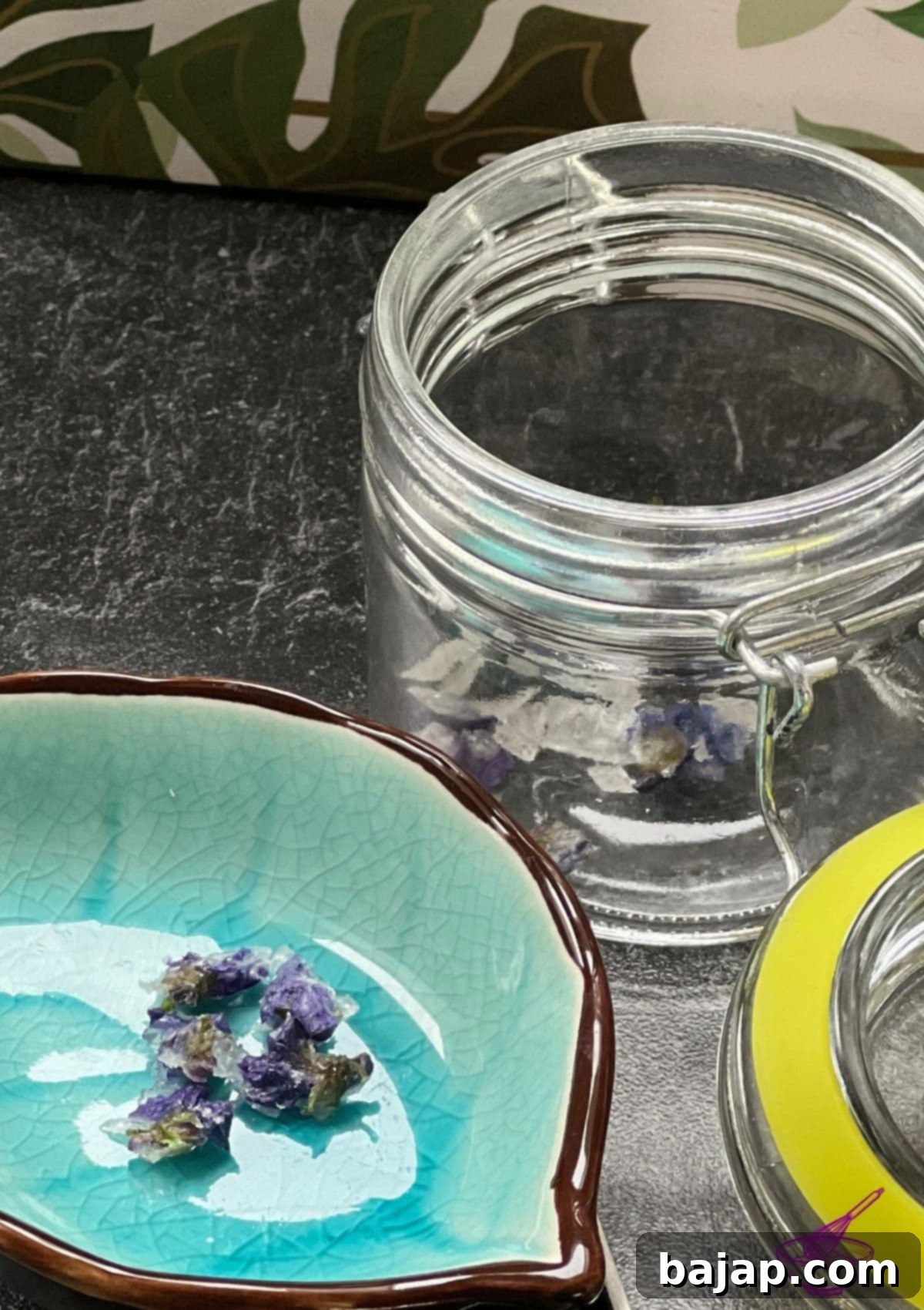 Empress Elisabeth's favorite treat: Candied Violets. Finished candied violets arranged on a drying rack, glittering with sugar.