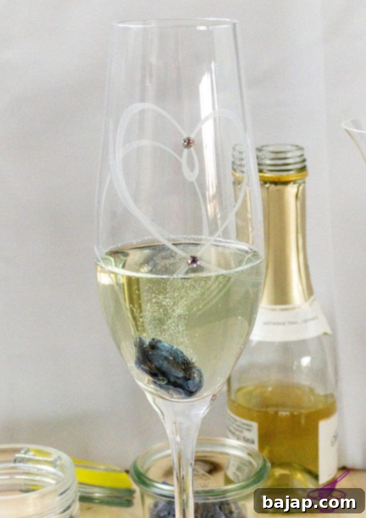 Sparkling wine with candied violets in a elegant flute, capturing the essence of spring