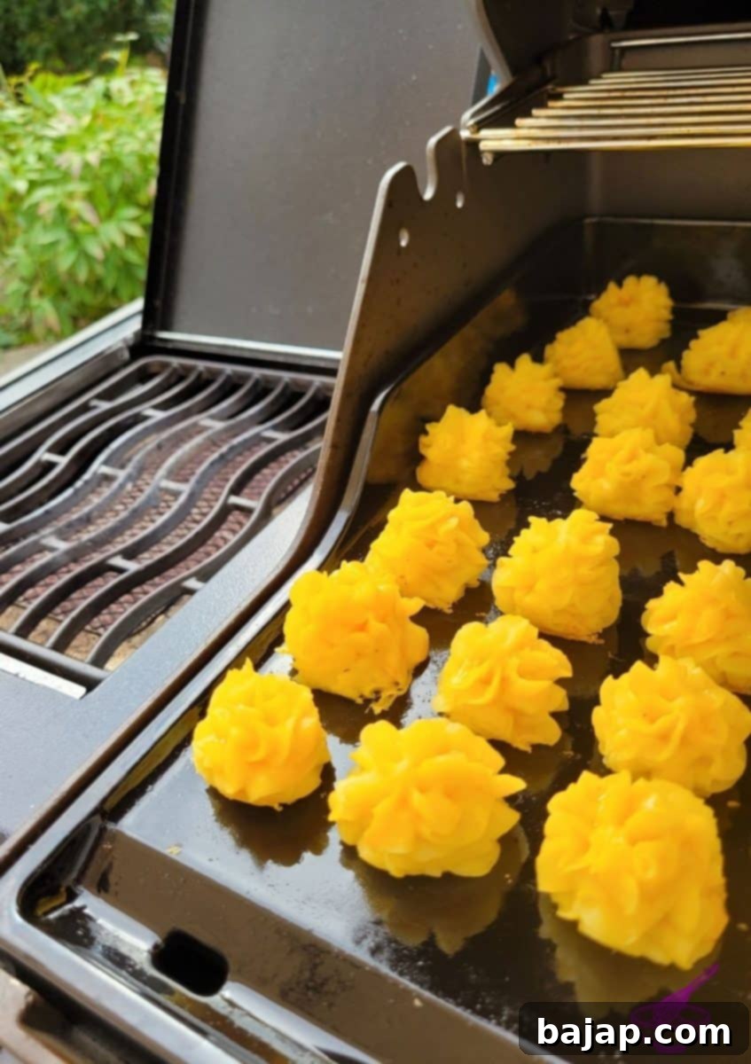 Piped mashed potatoes on the grill (Duchess Potatoes)