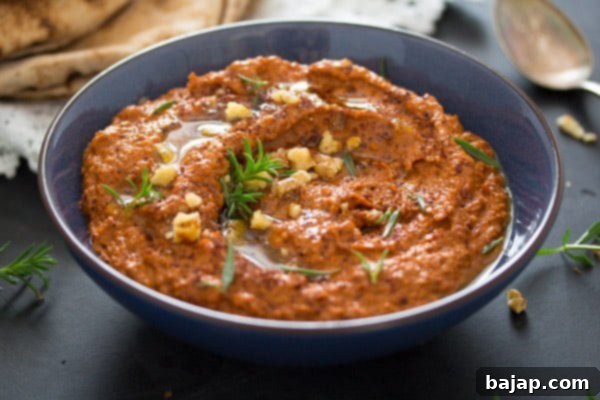Muhammara Dip - Roasted Peppers and Walnuts in a serving bowl.