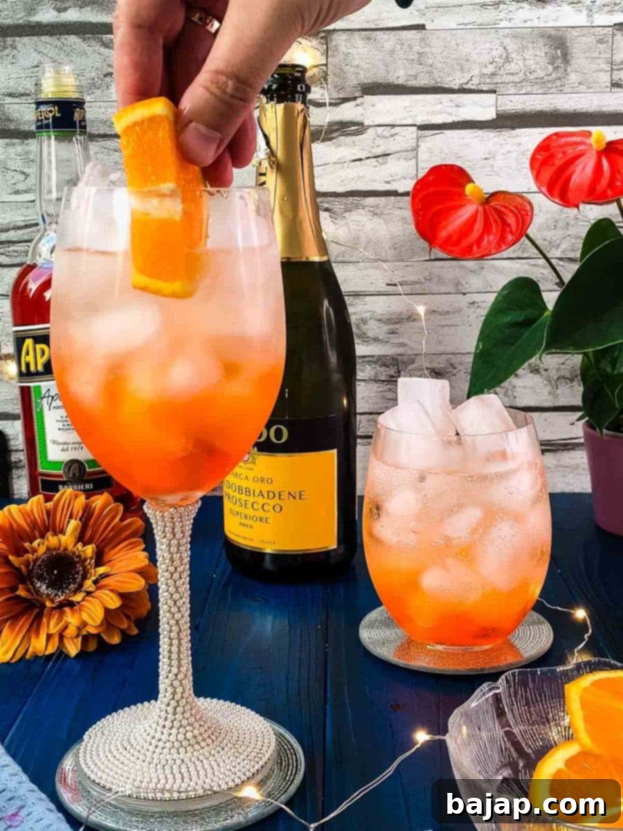 Garnish your delightful Aperol Spritz with a fresh orange wedge or disc for an authentic touch.