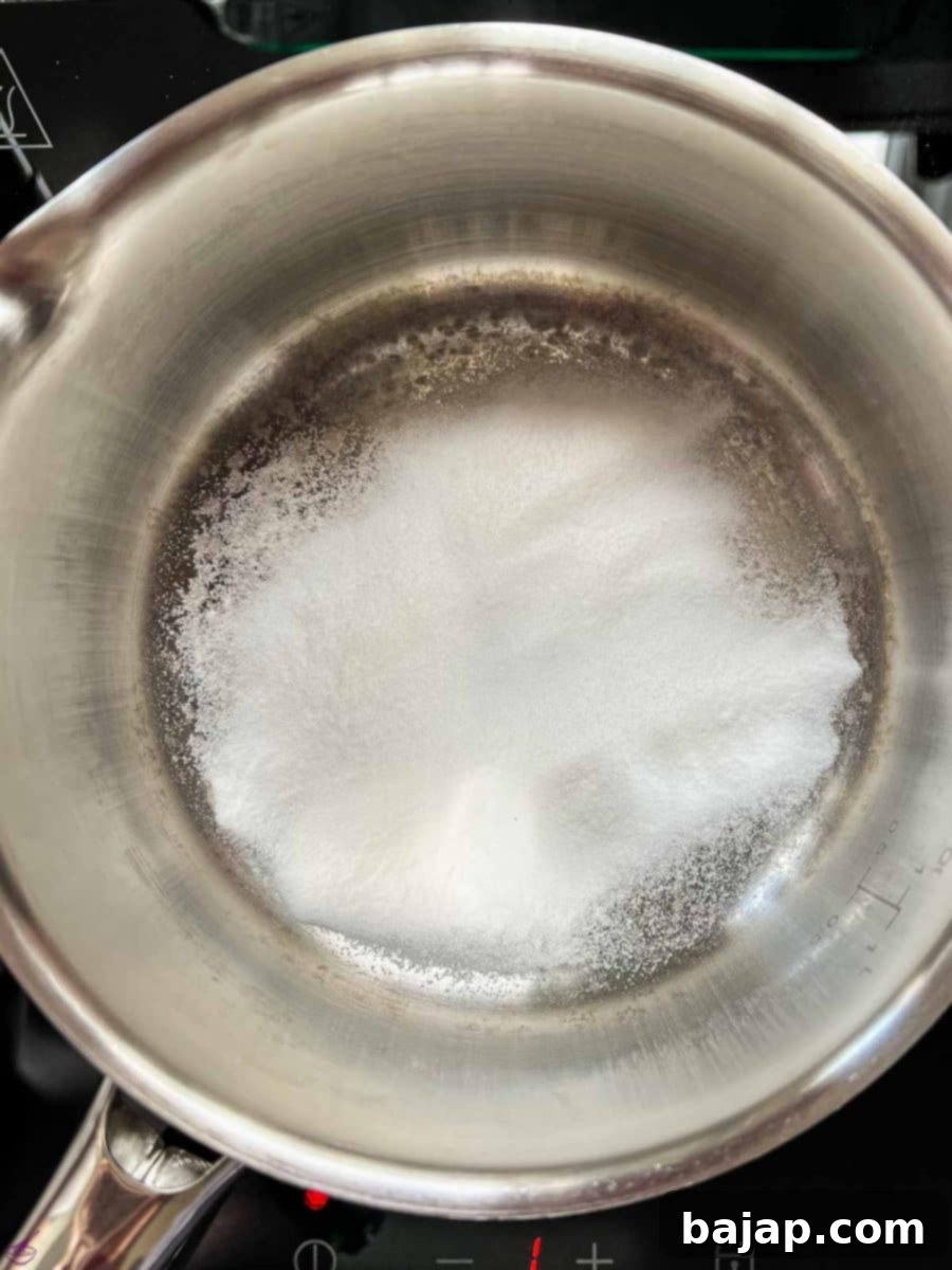 Easy 2 Ingredient Caramel Milk 4 Distribute the sugar evenly in the saucepan.
