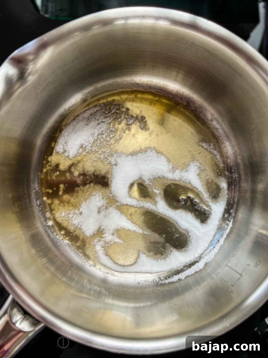 Saucepan - Nearly all the sugar has liquefied.