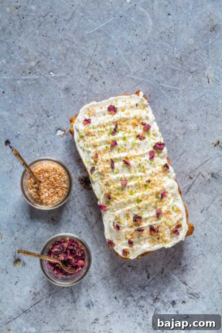 A slice of tropical lime mango and pineapple loaf cake, showing its moist texture.