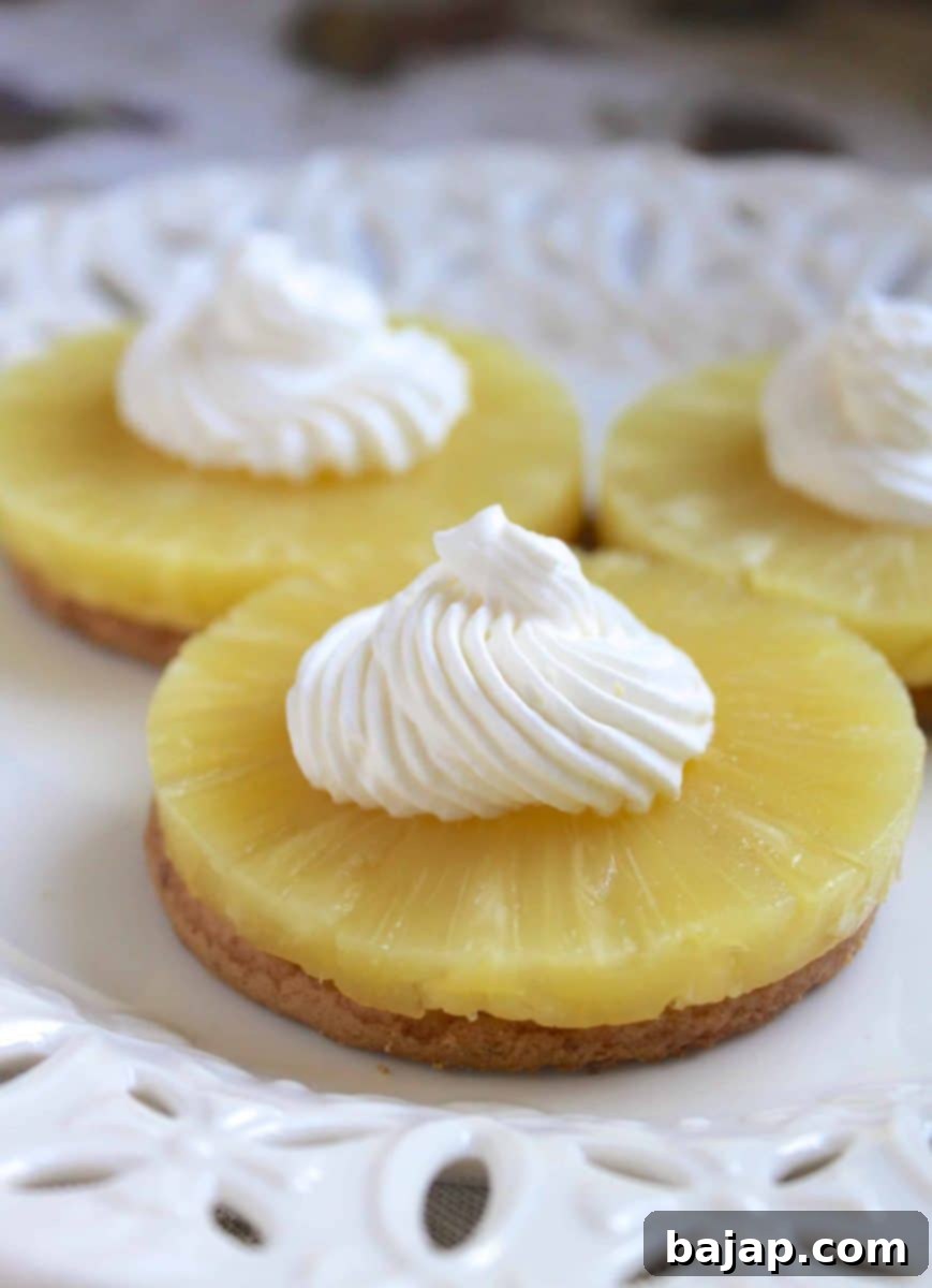 No-bake pineapple and cream dessert made with digestive cookies, layered beautifully.