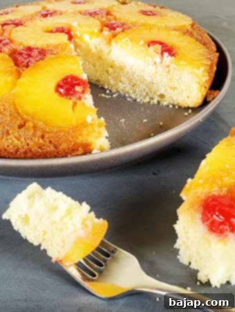 A perfectly baked caramelized pineapple upside down cake slice.
