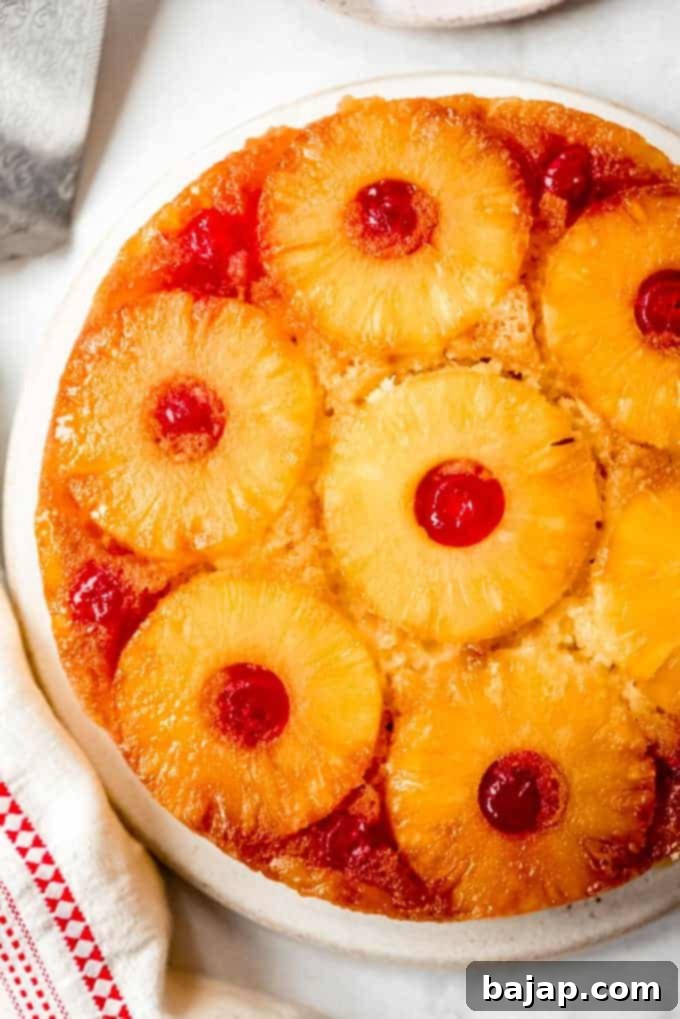 A classic pineapple upside down cake with a beautiful caramelized fruit topping.