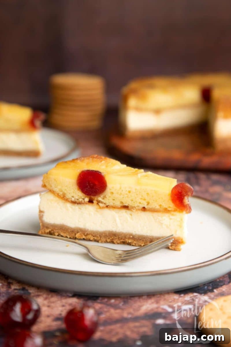 A pineapple upside down cheesecake with a creamy filling and caramelized topping.