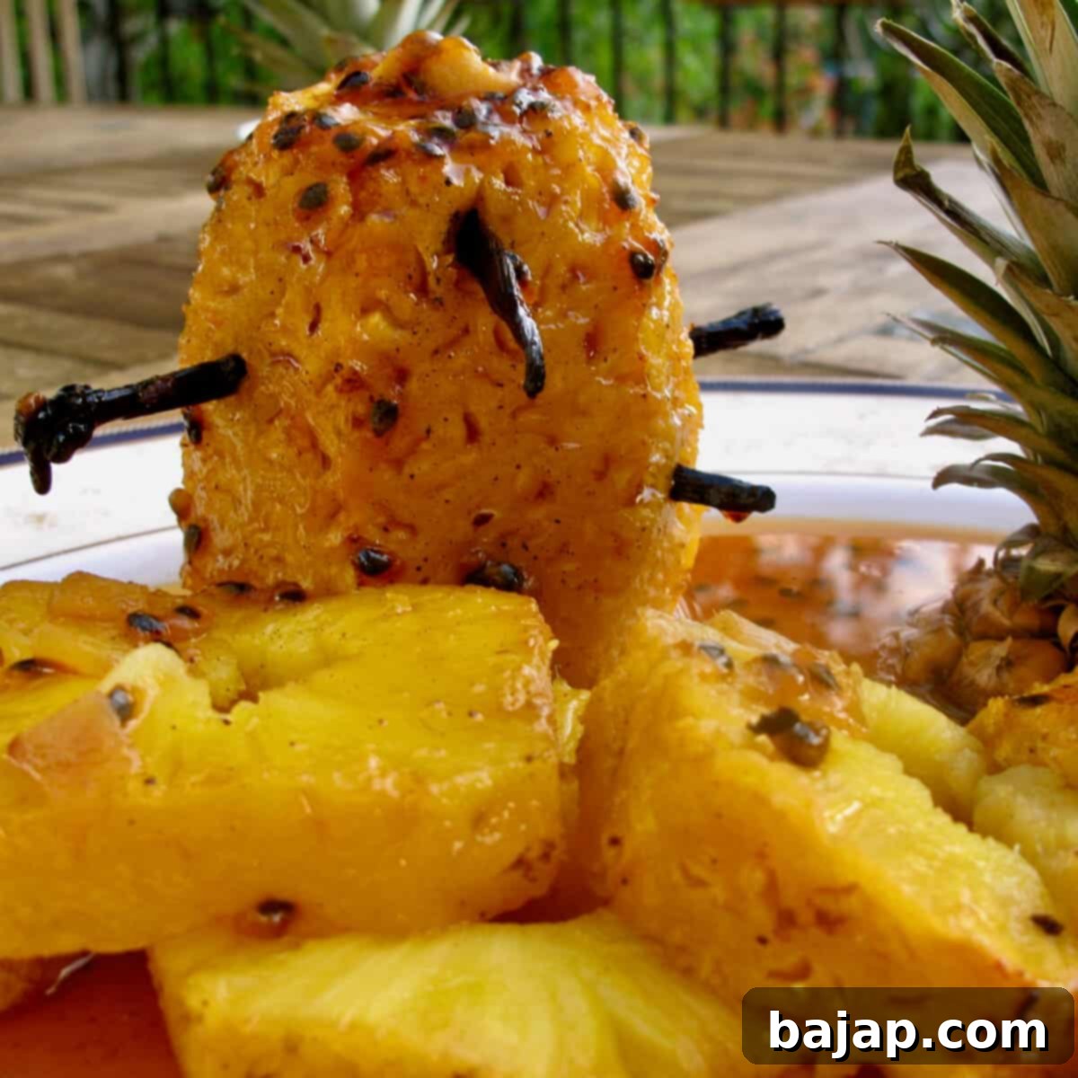 A whole roasted vanilla pineapple, caramelized and ready to be served.