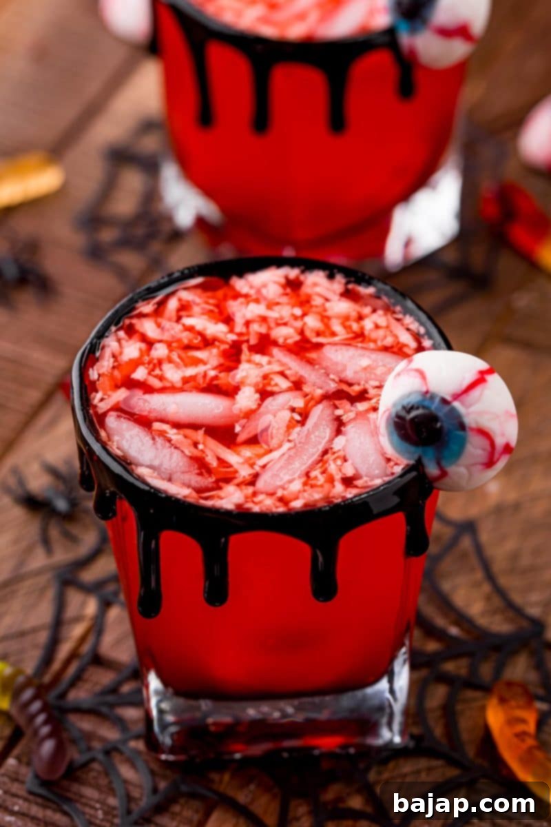 Halloween Party Werewolf Punch, a kid-friendly red drink, perfect for a spooky gathering.