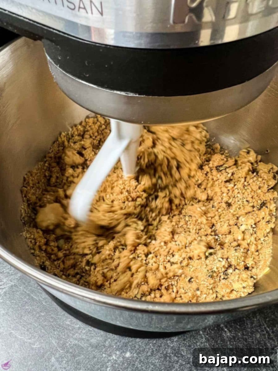 Combine grahem cracker crumbs with pumpkin seeds and butter.