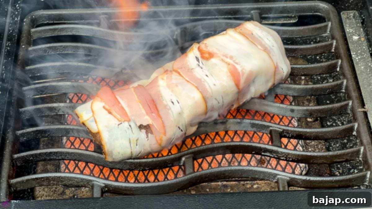 Venison loin wrapped in bacon seared on the sizzle zone.