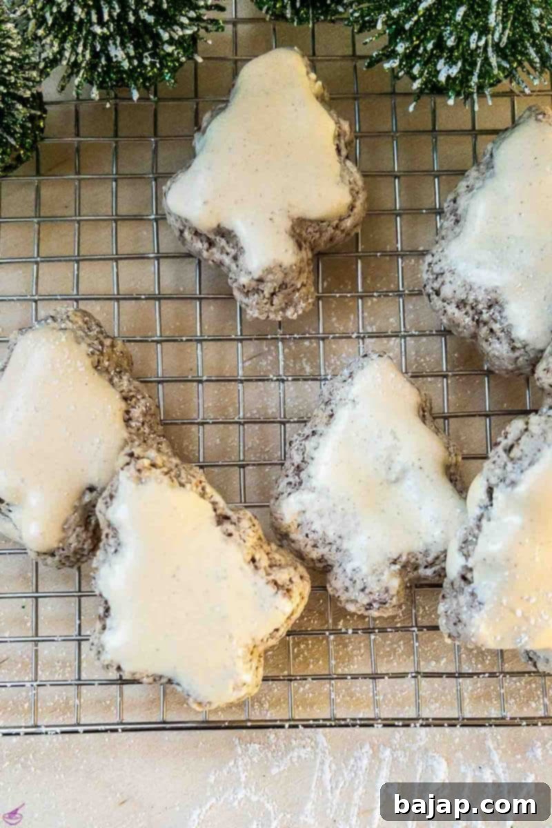 A stack of beautifully glazed cinnamon stars, perfect for a holiday treat.