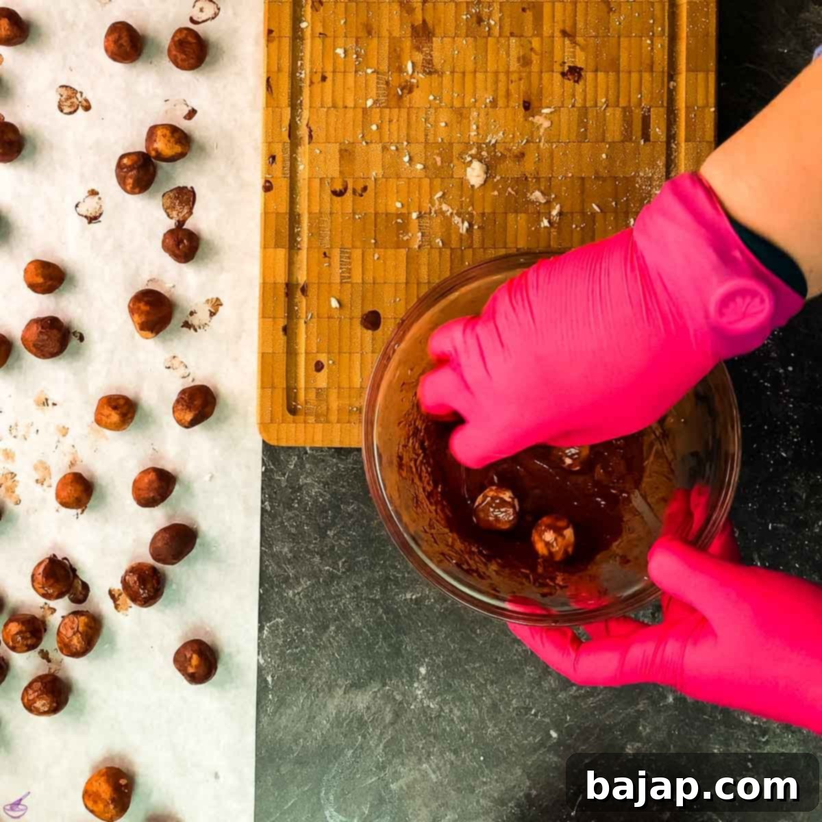 Roll the marzipan balls through a tad of melted chocolate until they look dull and dry.
