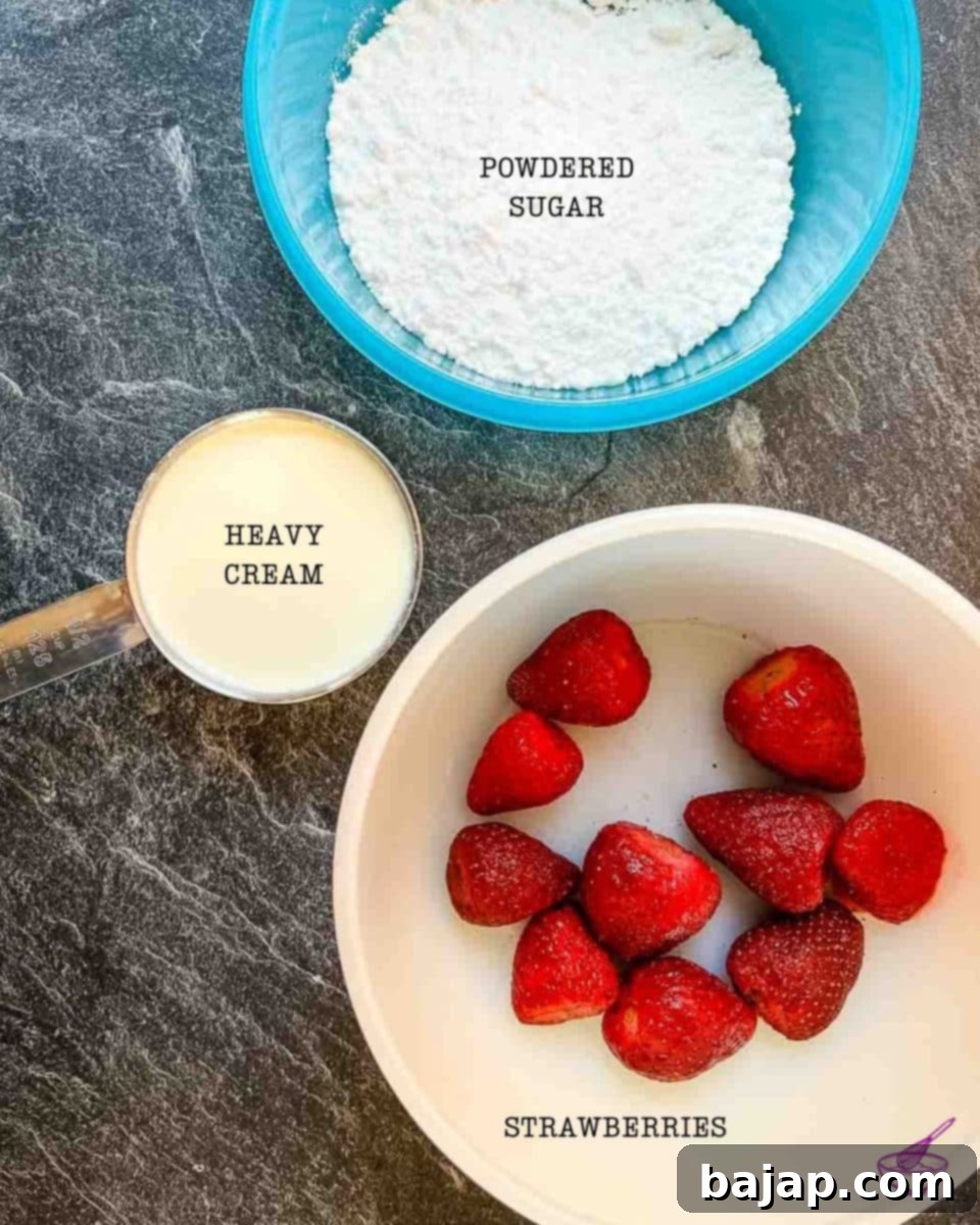 The strawberry cream requires only three ingredients: vibrant fresh strawberries, fine powdered sugar, and rich heavy whipping cream.