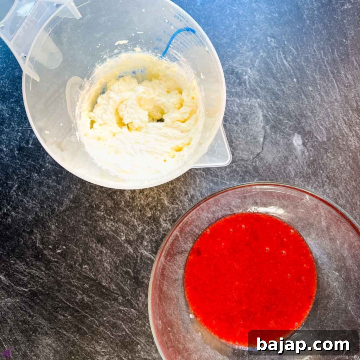 Sweetened strawberry purée and freshly whipped cream, perfectly prepared and ready to be combined for the ultimate dessert experience.