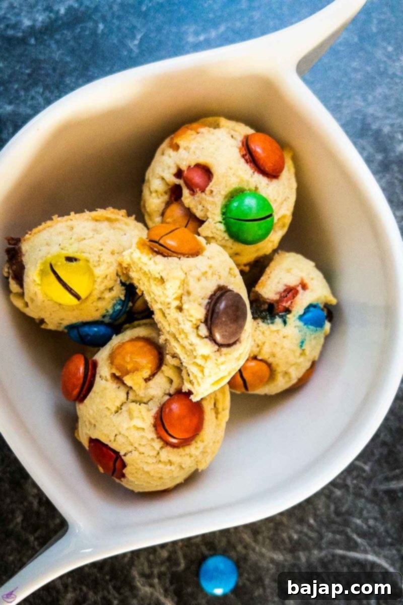 A delicious stack of freshly baked M&M Cookies, ready to be enjoyed.