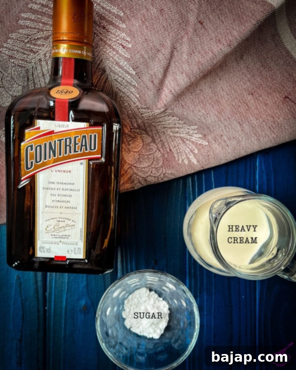 Three delicious ingredients for making an orange-flavored whipped cream.