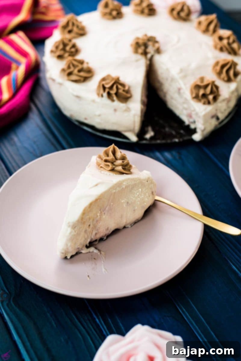 A delicious slice no bake strawberry cheesecake with Oreo walnut crust.